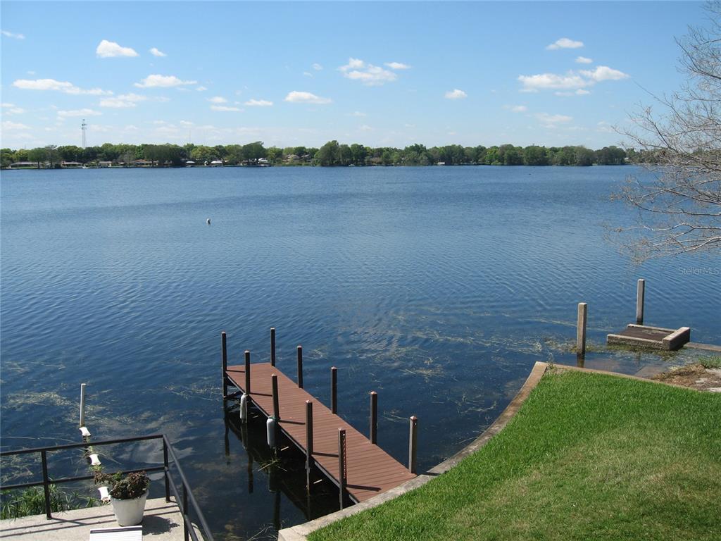 1500 Gay Road, Unit 18A Winter Park, FL 32789 - Photo 17 of 21 a view of a lake from a yard