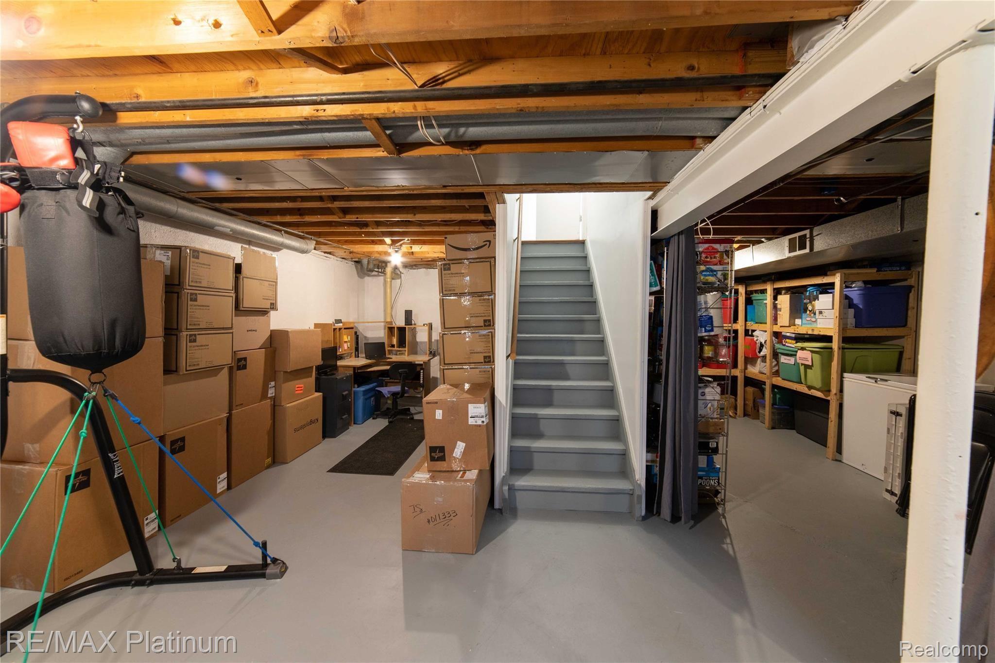 42289 Hanford Road Canton, MI 48187 - Photo 23 of 29 Unfinished basement with workshop area & storage