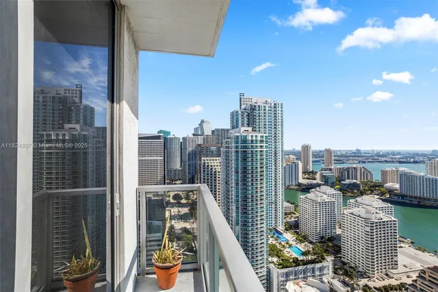 a view of a city with tall buildings