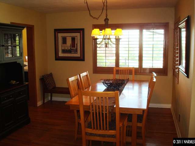3342 Corey Drive Reno, NV 89509 - Photo 13 of 13 a view of a dining room with furniture window and wooden floor