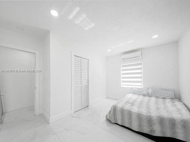 16125 Northwest 28th Place Miami Gardens, FL 33054 - Photo 20 of 25 a bedroom with a bed and a window