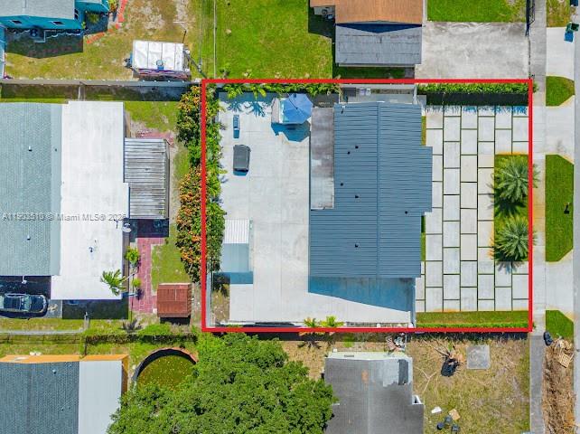 16125 Northwest 28th Place Miami Gardens, FL 33054 - Photo 7 of 25 an aerial view of a house with swimming pool and outdoor space