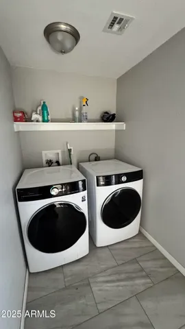 a kitchen with a stove and a sink