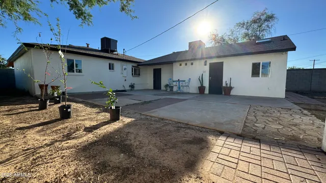 a view of a backyard of the house