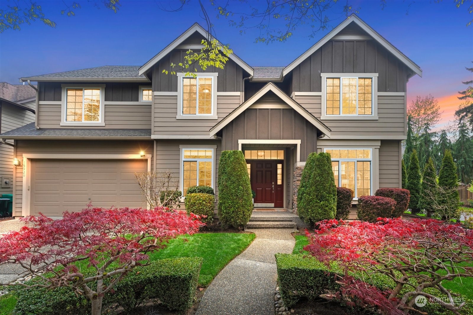 15929 36th Avenue Southeast Bothell, WA 98012 - Photo 1 of 33 a front view of a house with garden