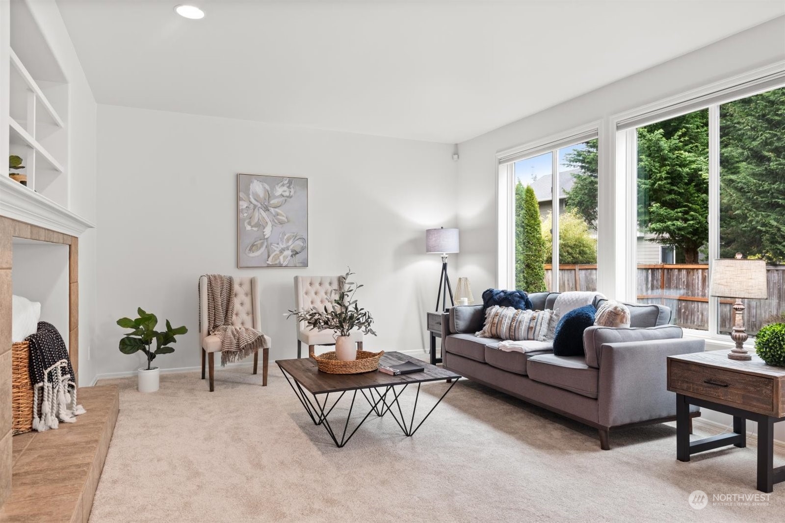 15929 36th Avenue Southeast Bothell, WA 98012 - Photo 11 of 33 a living room with furniture and a large window