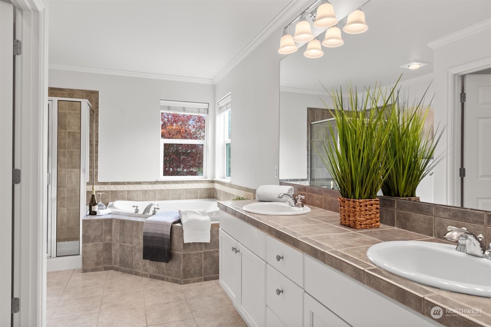 15929 36th Avenue Southeast Bothell, WA 98012 - Photo 17 of 33 a bathroom with a double vanity sink window and mirror