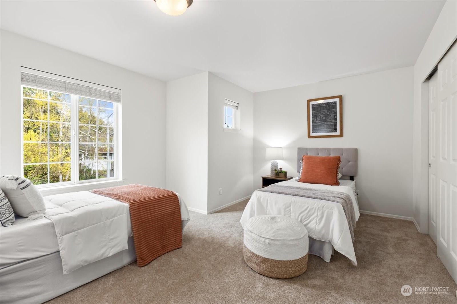 15929 36th Avenue Southeast Bothell, WA 98012 - Photo 20 of 33 a bedroom with a bed and a couch
