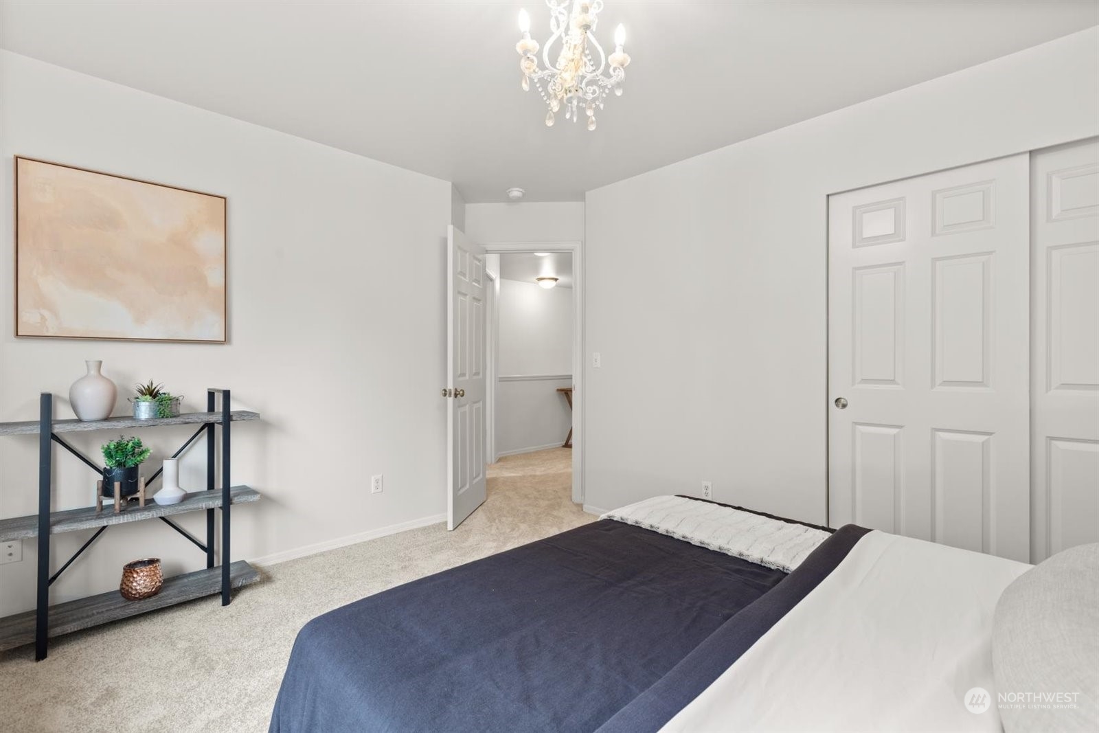 15929 36th Avenue Southeast Bothell, WA 98012 - Photo 21 of 33 a bedroom with a bed and a table in it