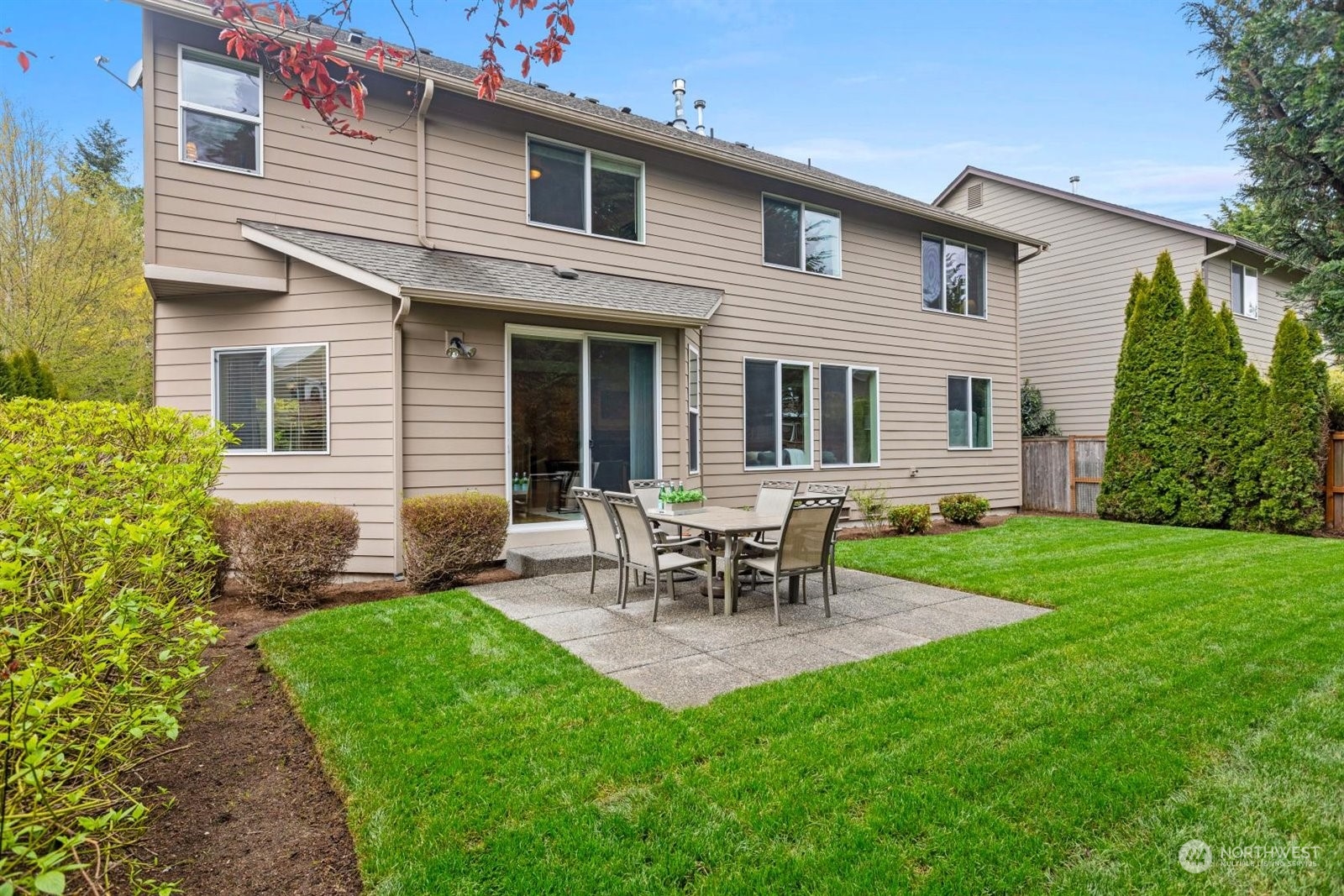 15929 36th Avenue Southeast Bothell, WA 98012 - Photo 28 of 33 a view of a house with patio and a yard