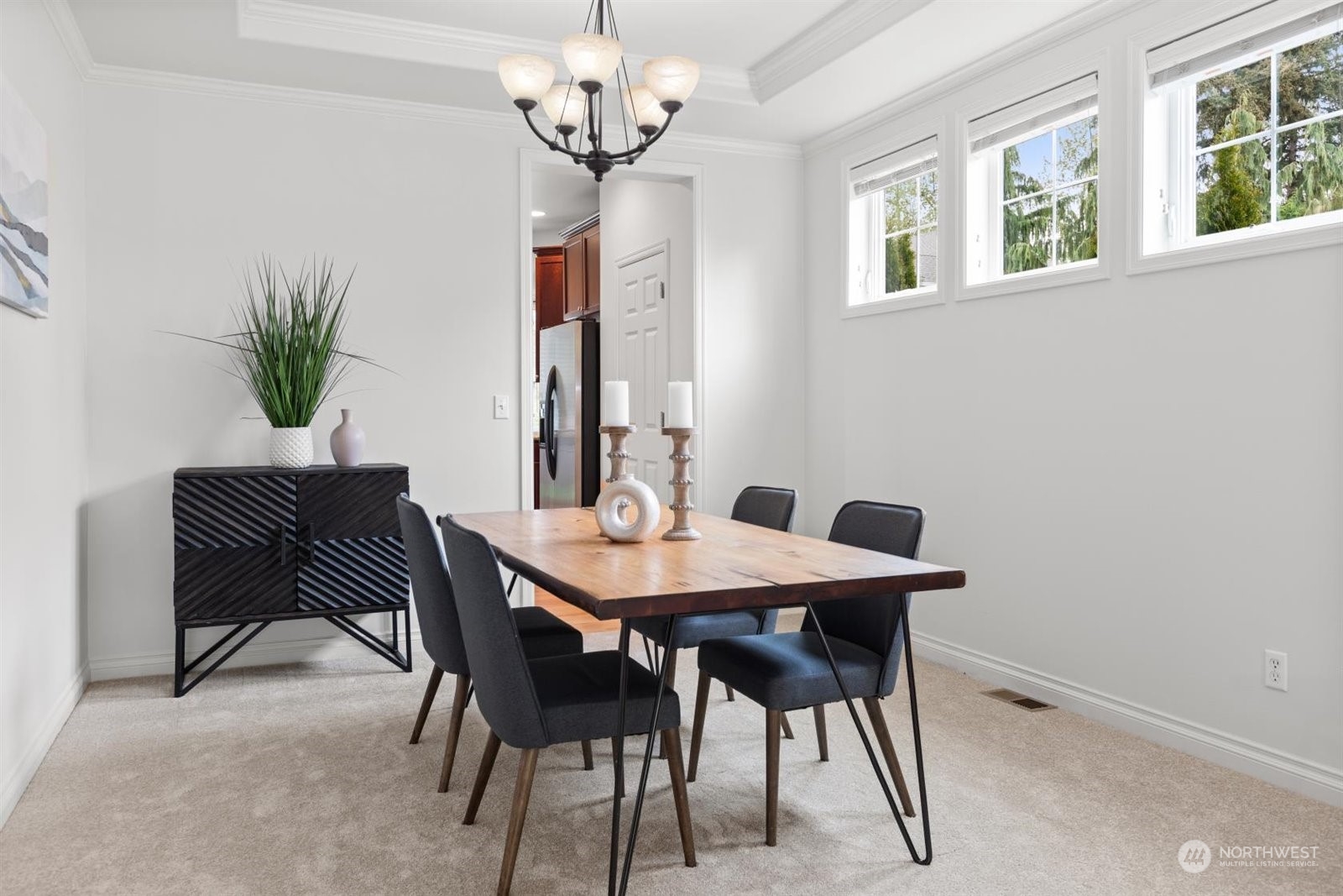 15929 36th Avenue Southeast Bothell, WA 98012 - Photo 5 of 33 a view of a dining room with furniture and chandelier