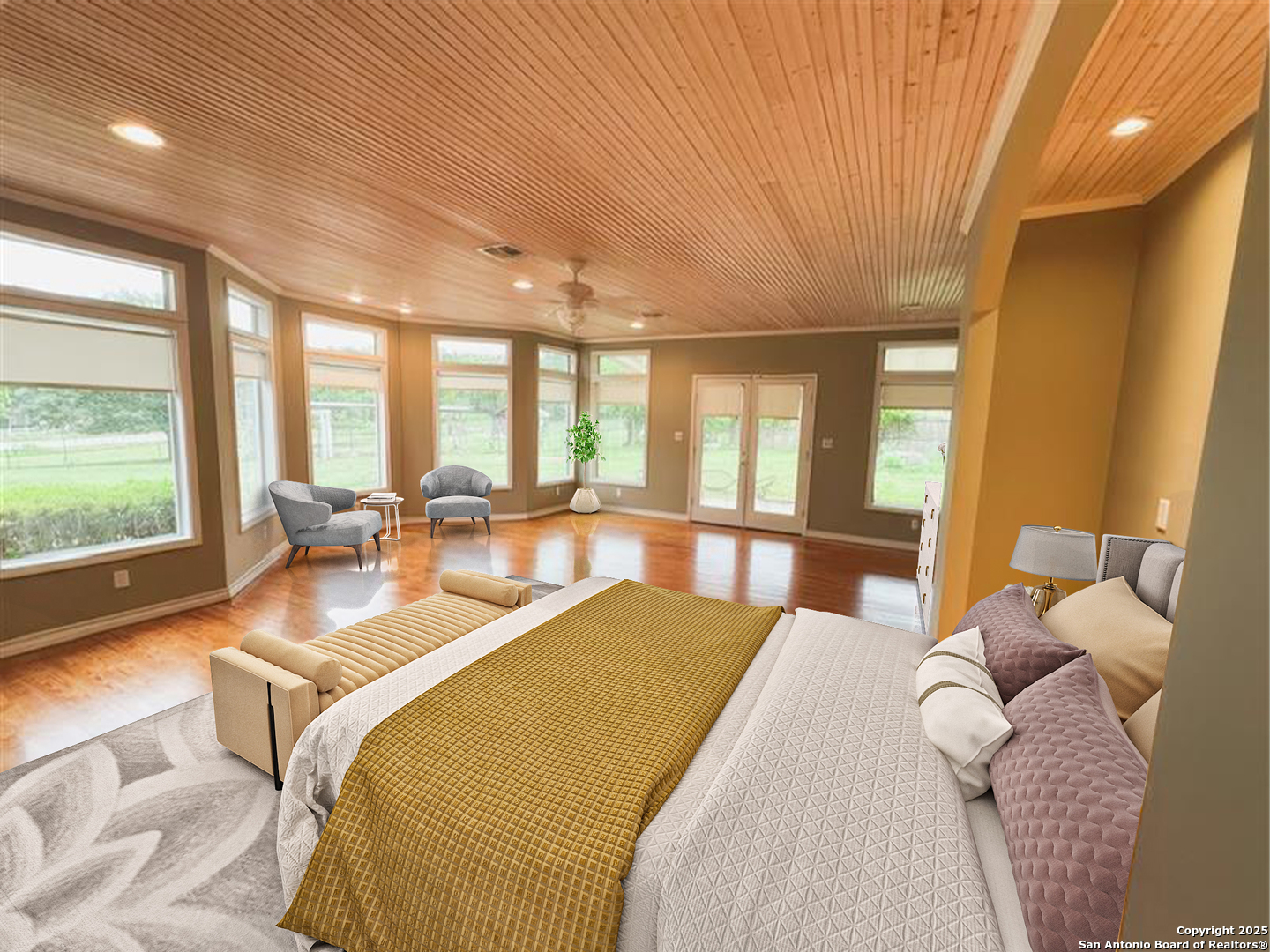 148 Robindale West Road Bandera, TX 78003 - Photo 11 of 24 a bed sitting in a spacious bedroom next to a window