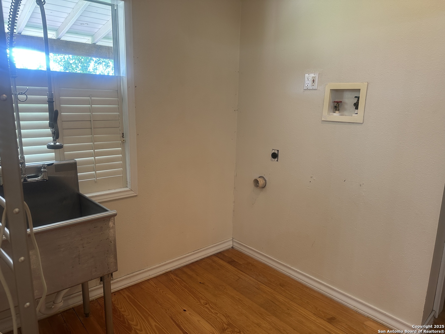 148 Robindale West Road Bandera, TX 78003 - Photo 15 of 24 a view of a small space with wooden floor and a window