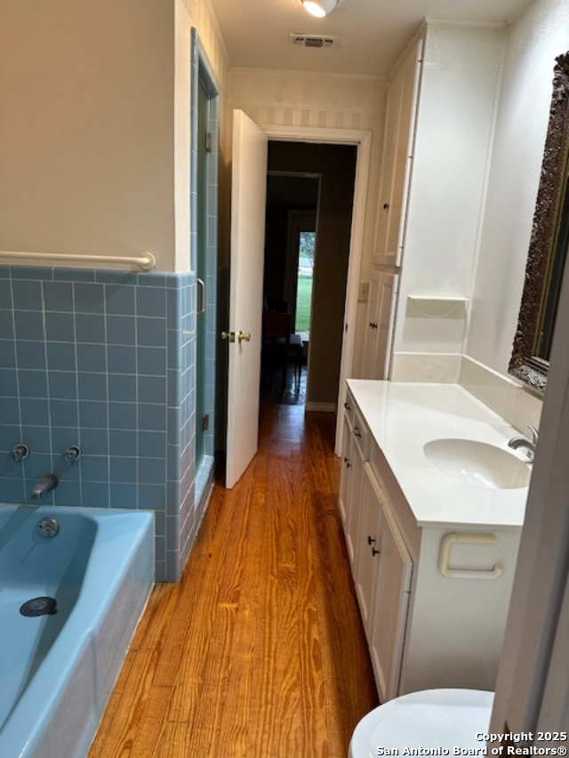 148 Robindale West Road Bandera, TX 78003 - Photo 20 of 24 a bathroom with a sink a toilet and shower