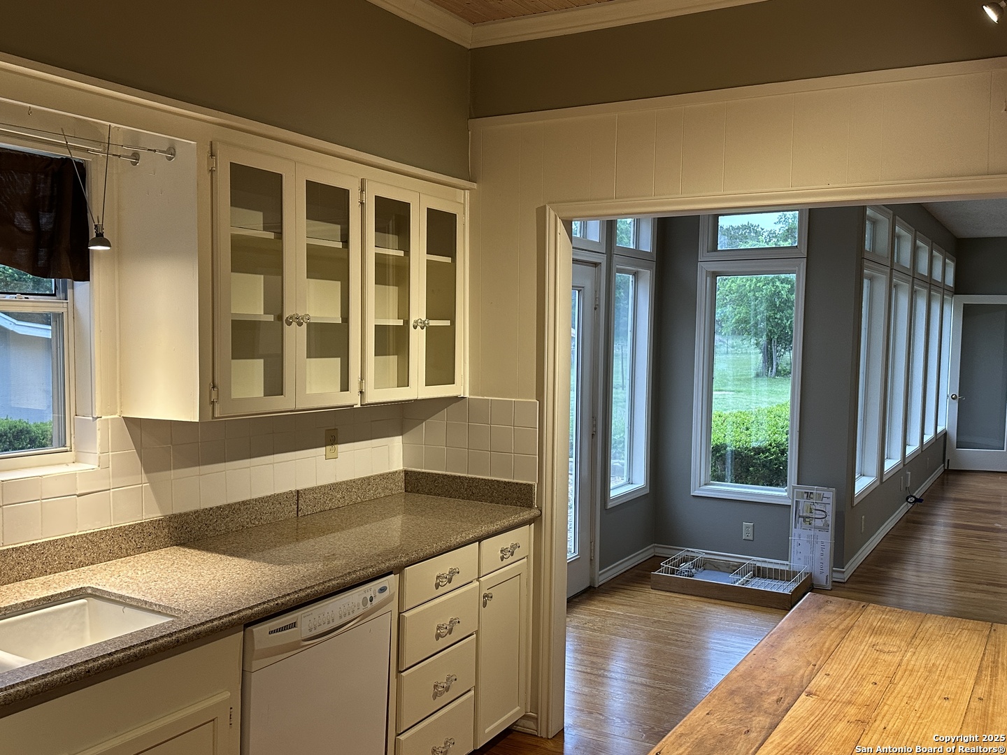 148 Robindale West Road Bandera, TX 78003 - Photo 6 of 24 a kitchen with a sink and large window
