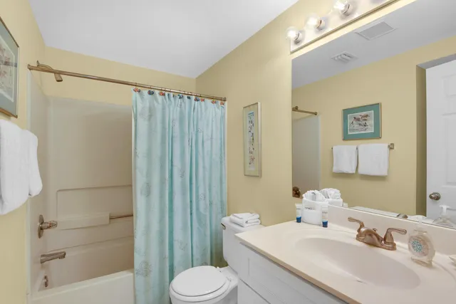 a view of a living room and dining room