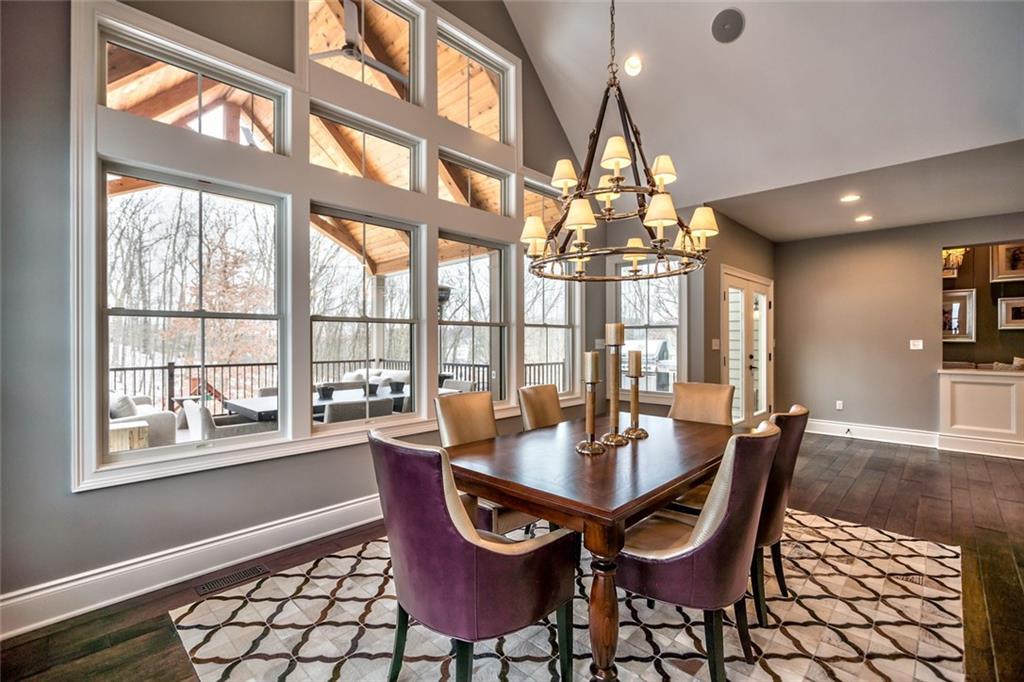 817 Mt Pleasant Road Mars, PA 16046 - Photo 8 of 25 The morning room with vaulted ceiling, built-in speakers, wall of windows providing plenty of natural light, a stately Ralph Lauren chandelier and access to the deck.