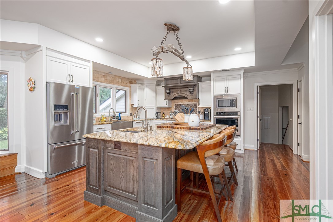 205 Bartram Road Savannah, GA 31411 - Photo 12 of 43 This Kitchen is one that has it all. The center i