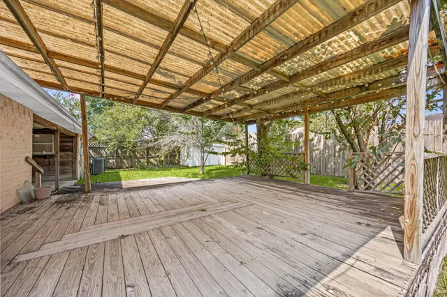 a view of porch with a wooden deck