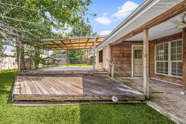 a view of backyard with green space