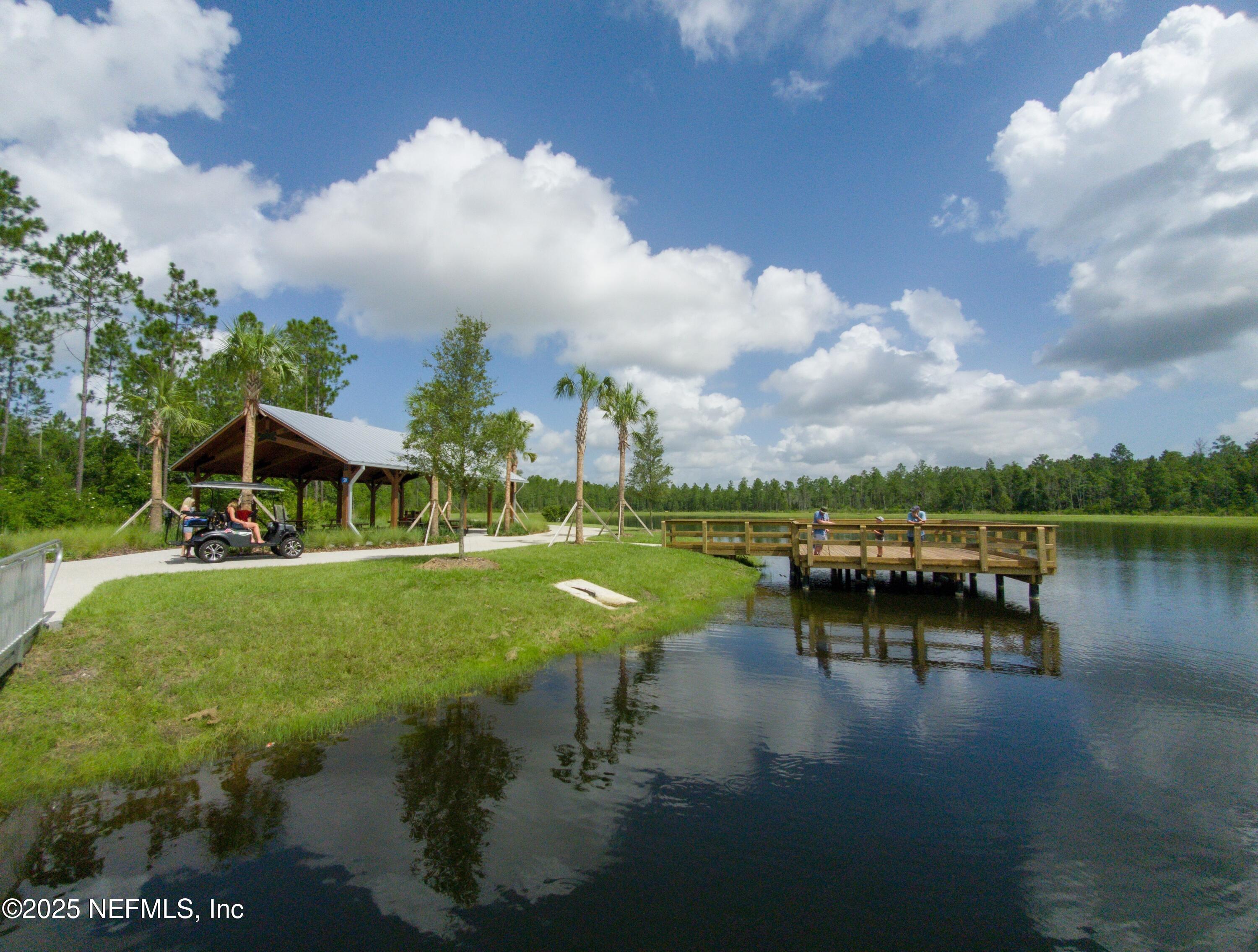 25 Carnauba Way Jacksonville, FL 32081 - Photo 14 of 16 a view of a lake in a garden
