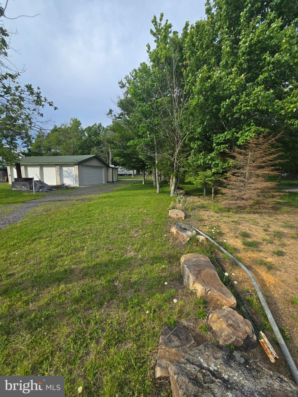 700 Paul Stahl Road Mount Storm, WV 26739 - Photo 1 of 31 Serene green space with rustic charm.