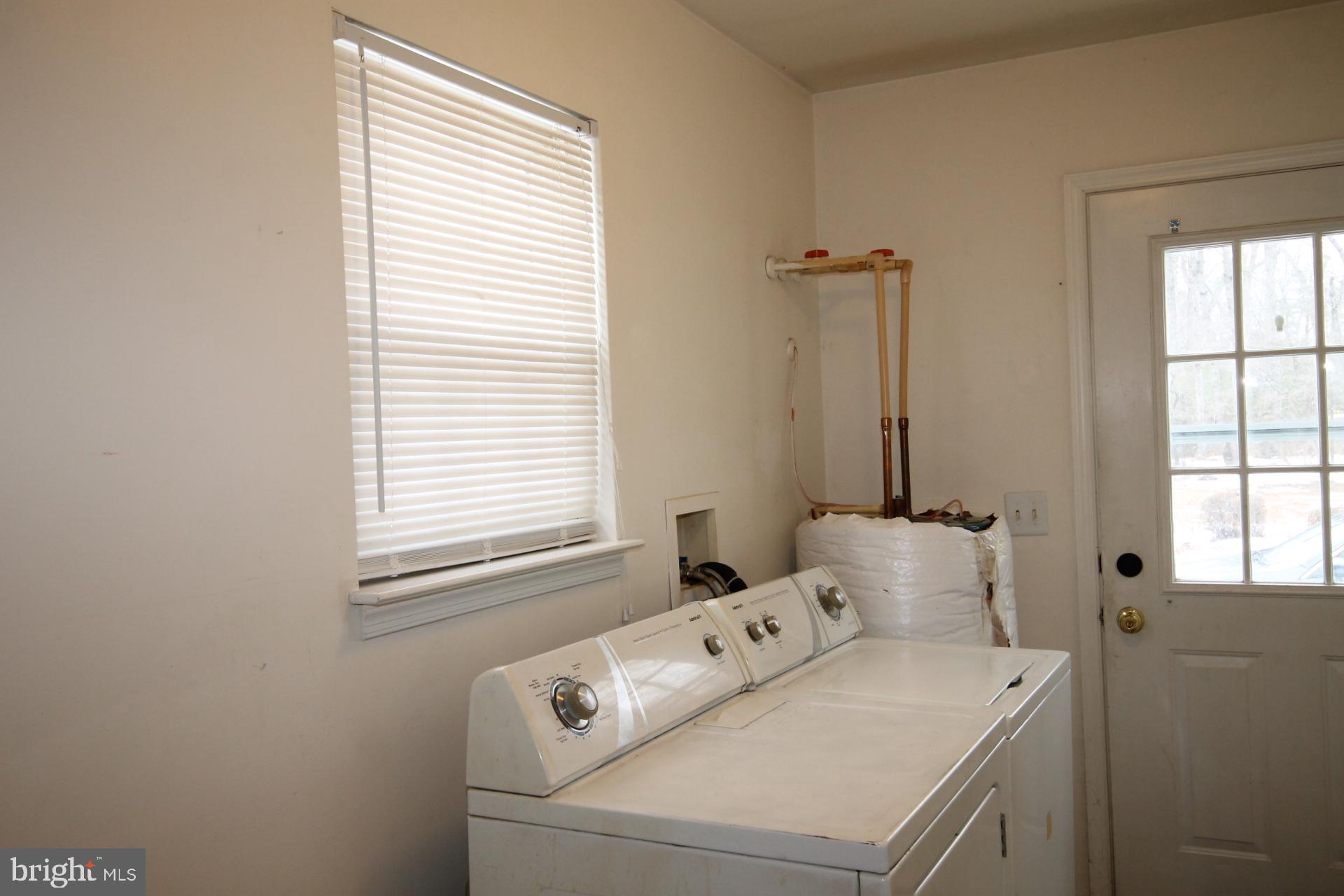25880 Brookwood Road Greensboro, MD 21639 - Photo 9 of 20 Laundry/mud room with outside entry
