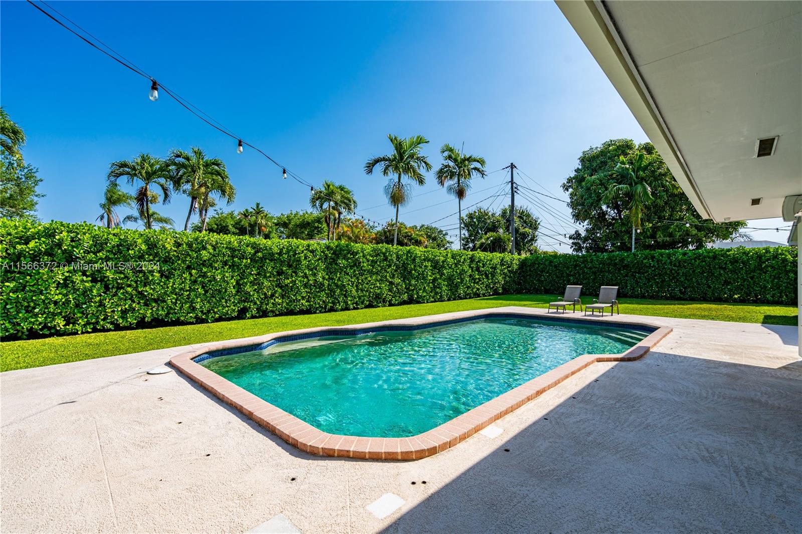 8341 Southwest 87th Terrace Miami, FL 33143 - Photo 23 of 31 a view of a swimming pool and outdoor space