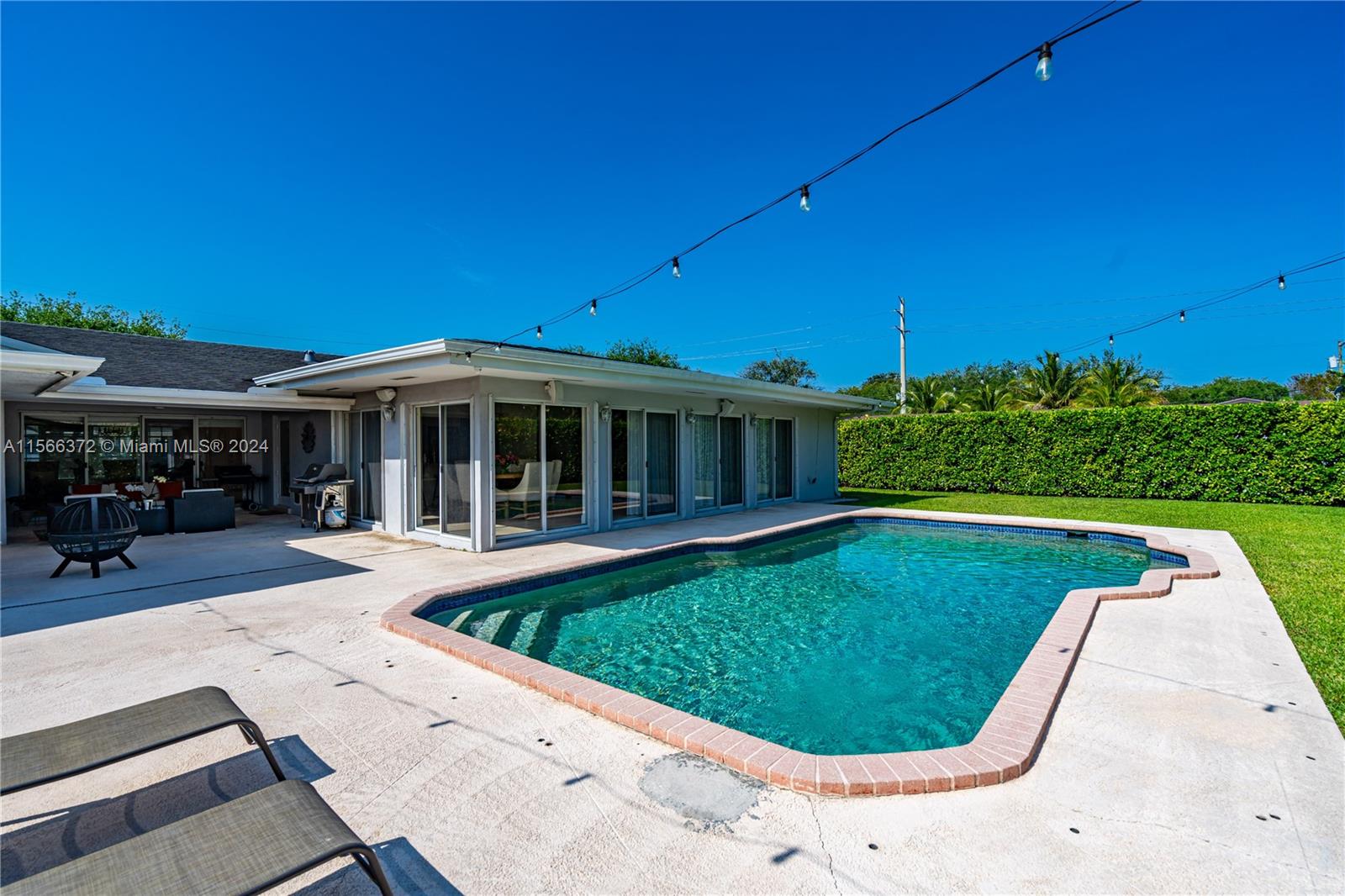 8341 Southwest 87th Terrace Miami, FL 33143 - Photo 24 of 31 a view of a house with swimming pool