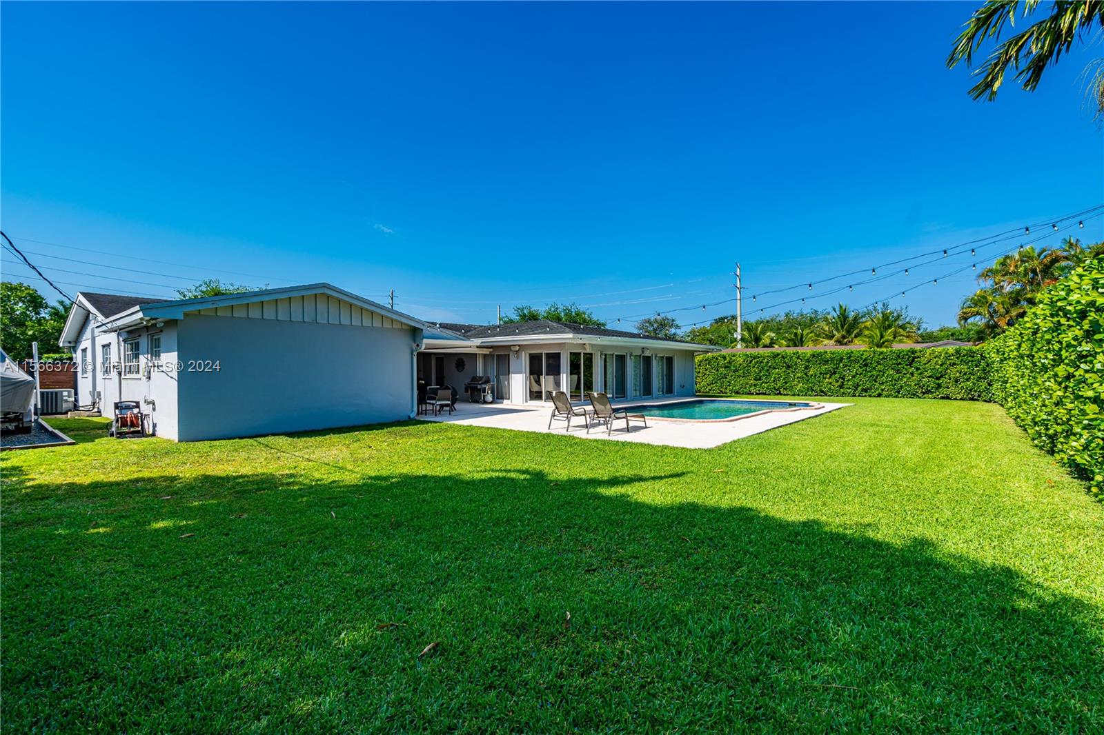 8341 Southwest 87th Terrace Miami, FL 33143 - Photo 25 of 31 a view of a house with a big yard
