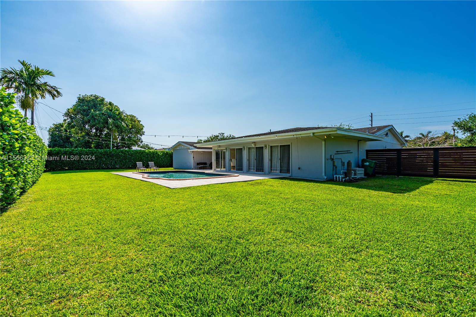 8341 Southwest 87th Terrace Miami, FL 33143 - Photo 27 of 31 a house view with a swimming pool