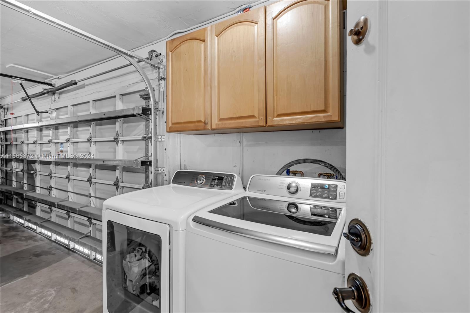 8341 Southwest 87th Terrace Miami, FL 33143 - Photo 31 of 31 a utility room with dryer and washer