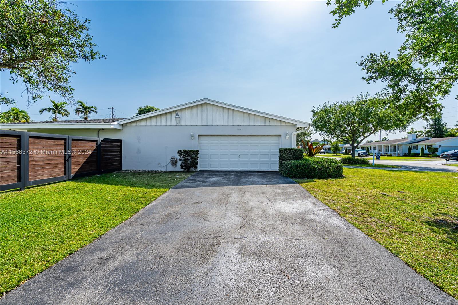 8341 Southwest 87th Terrace Miami, FL 33143 - Photo 4 of 31 a view of a house with a yard