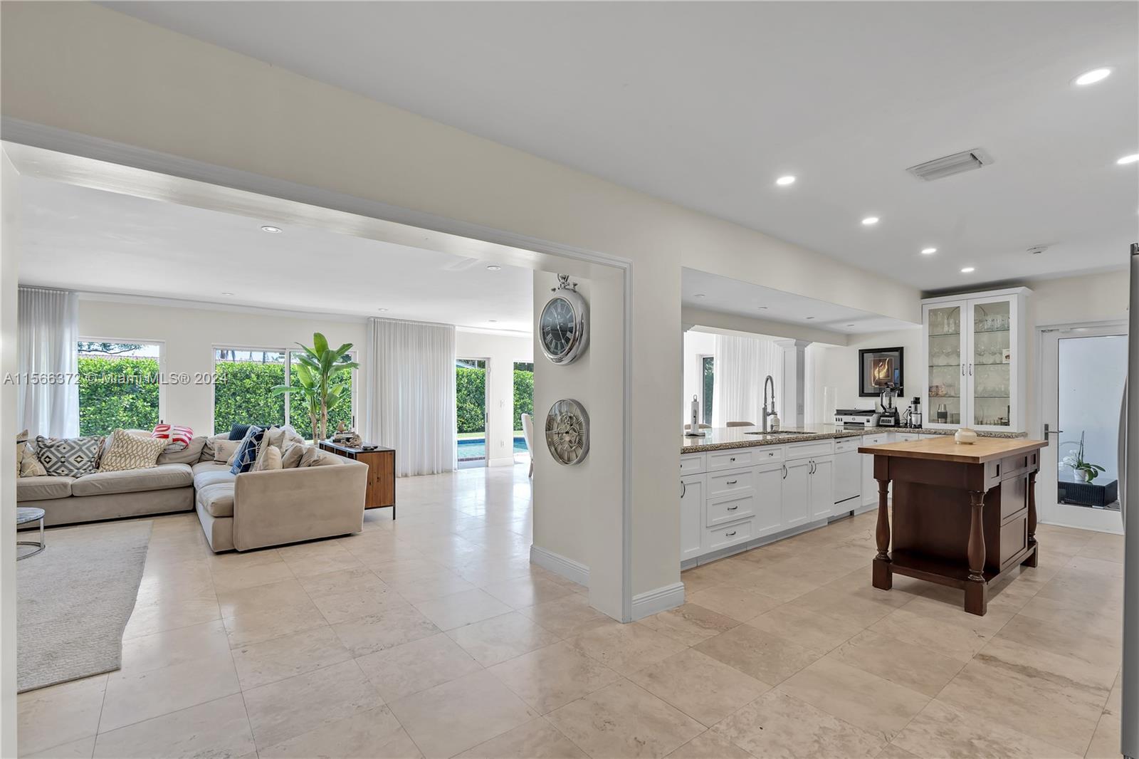 8341 Southwest 87th Terrace Miami, FL 33143 - Photo 6 of 31 a living room with furniture and a table