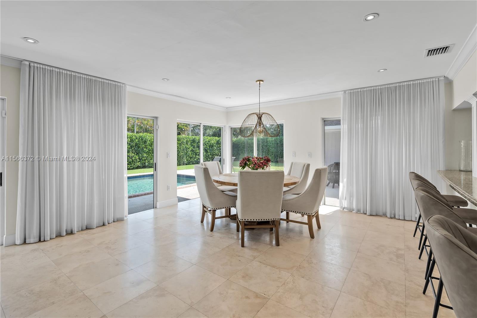 8341 Southwest 87th Terrace Miami, FL 33143 - Photo 10 of 31 a dining room with furniture and window