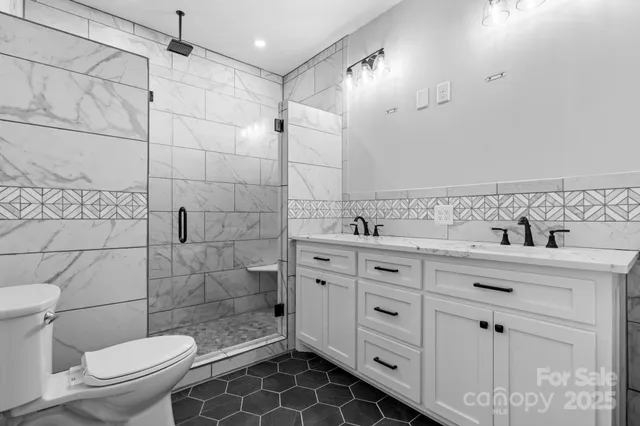 a white bath tub sitting in a bathroom