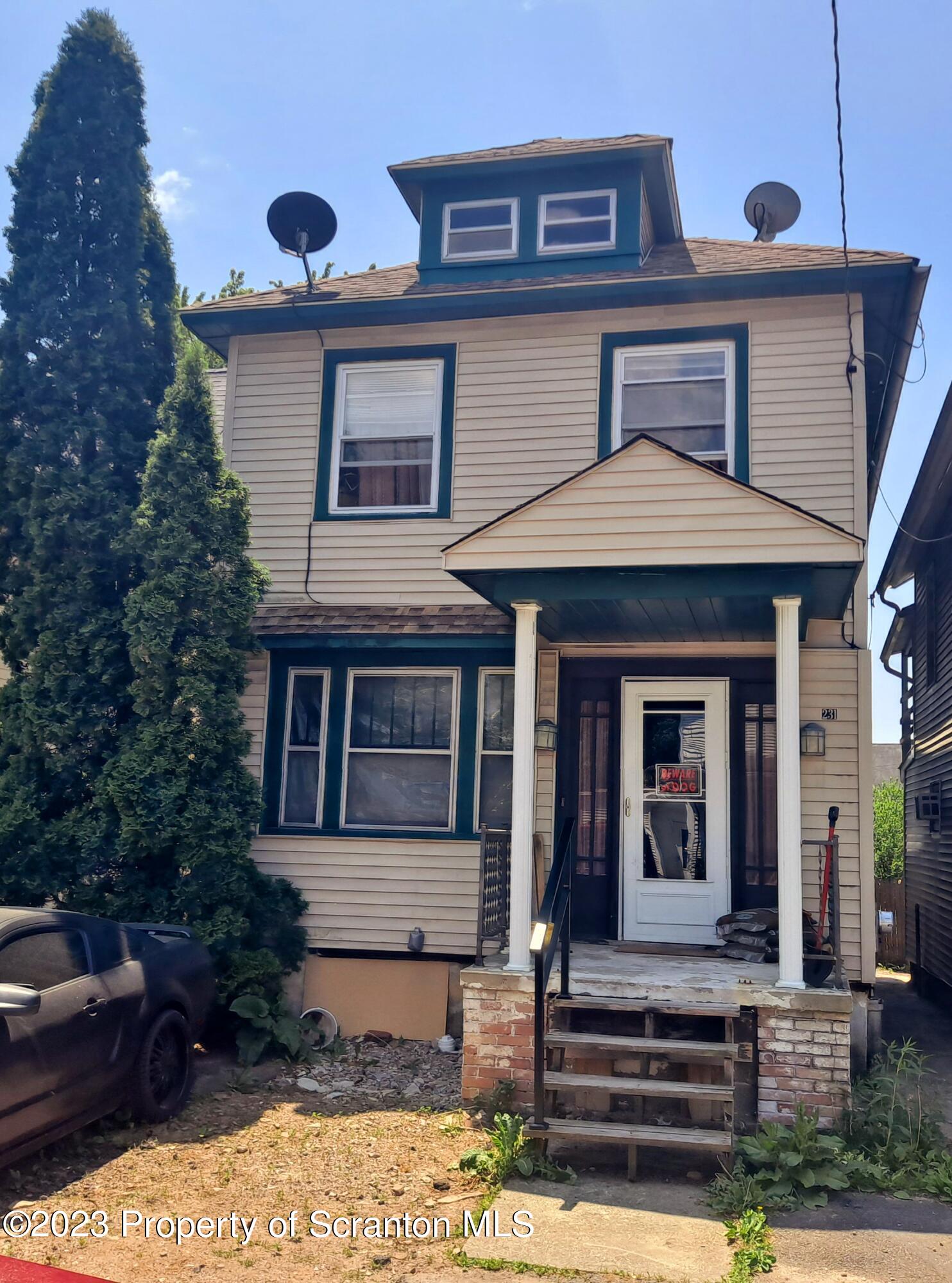 231 Putnam Street Scranton, PA 18508 - Photo 2 of 13 a front view of a house with garden
