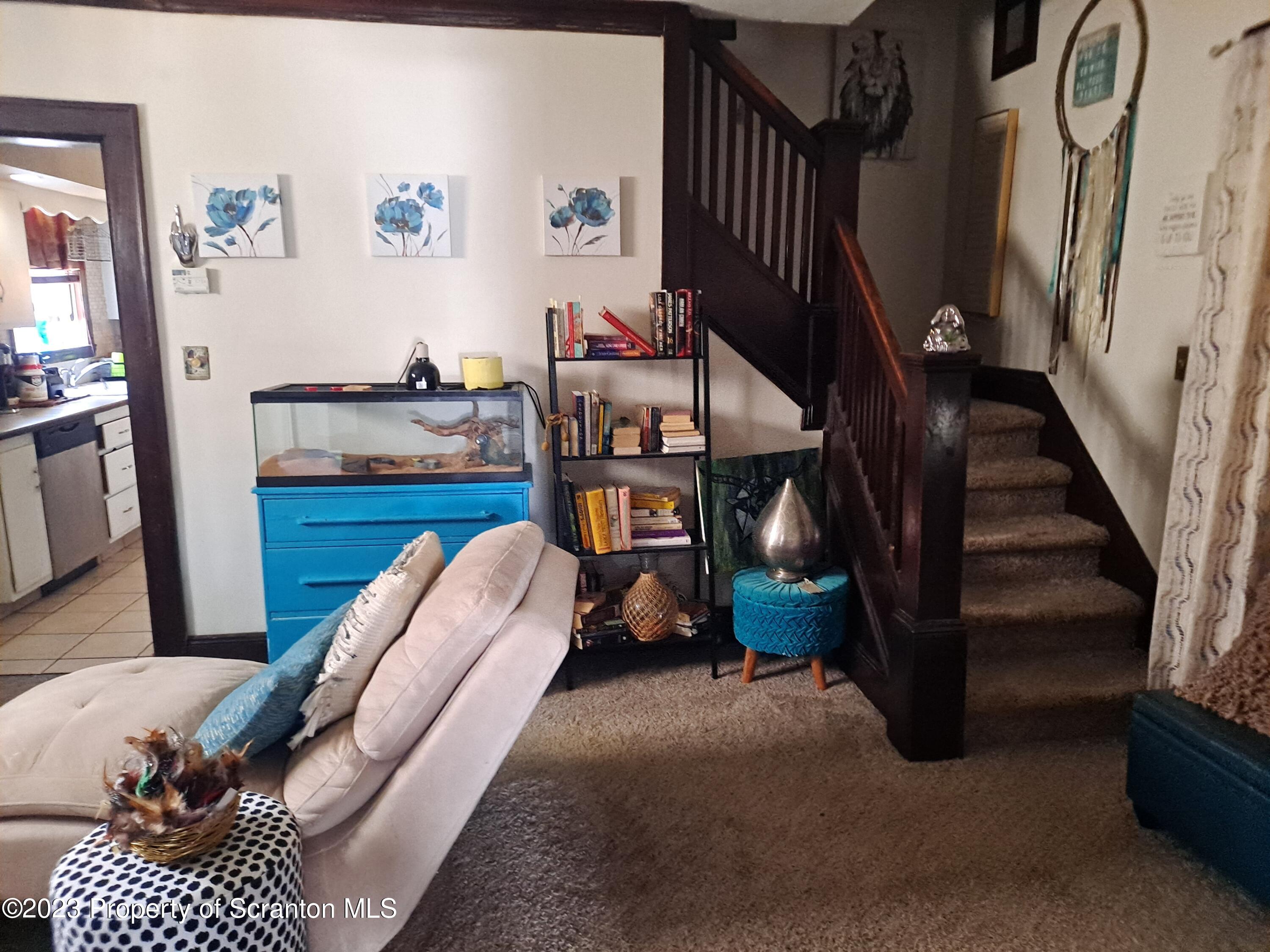 231 Putnam Street Scranton, PA 18508 - Photo 6 of 13 a view of livingroom with furniture and stairs