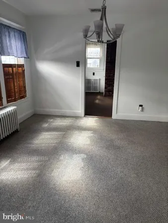 a view of a livingroom with a fireplace