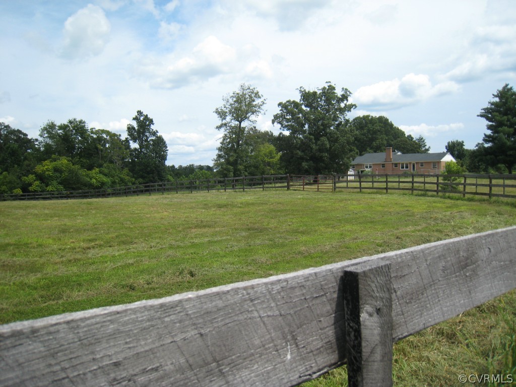 9855 Red House Road Red House, VA 23963 - Photo 4 of 24 a view of a lake with a big yard