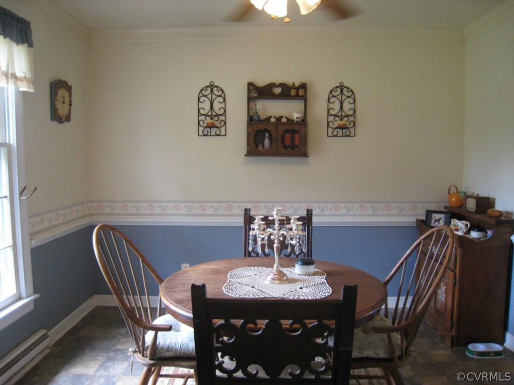 9855 Red House Road Red House, VA 23963 - Photo 8 of 24 a view of a dining room with furniture and wooden floor