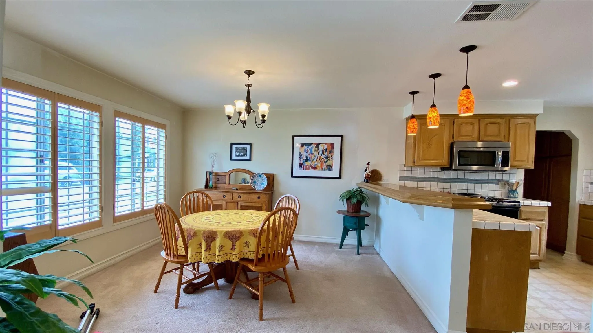 167 Marcheta Street Encinitas, CA 92024 - Photo 5 of 21 a view of a dining room with furniture window and outside view