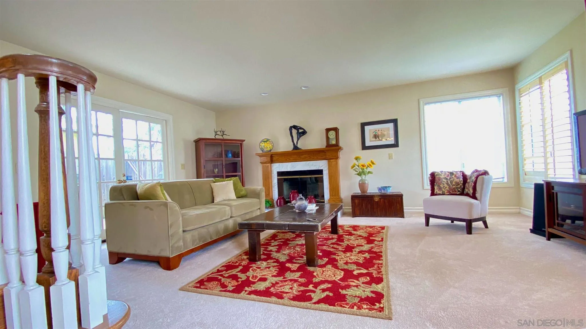 167 Marcheta Street Encinitas, CA 92024 - Photo 7 of 21 a living room with furniture fireplace and window