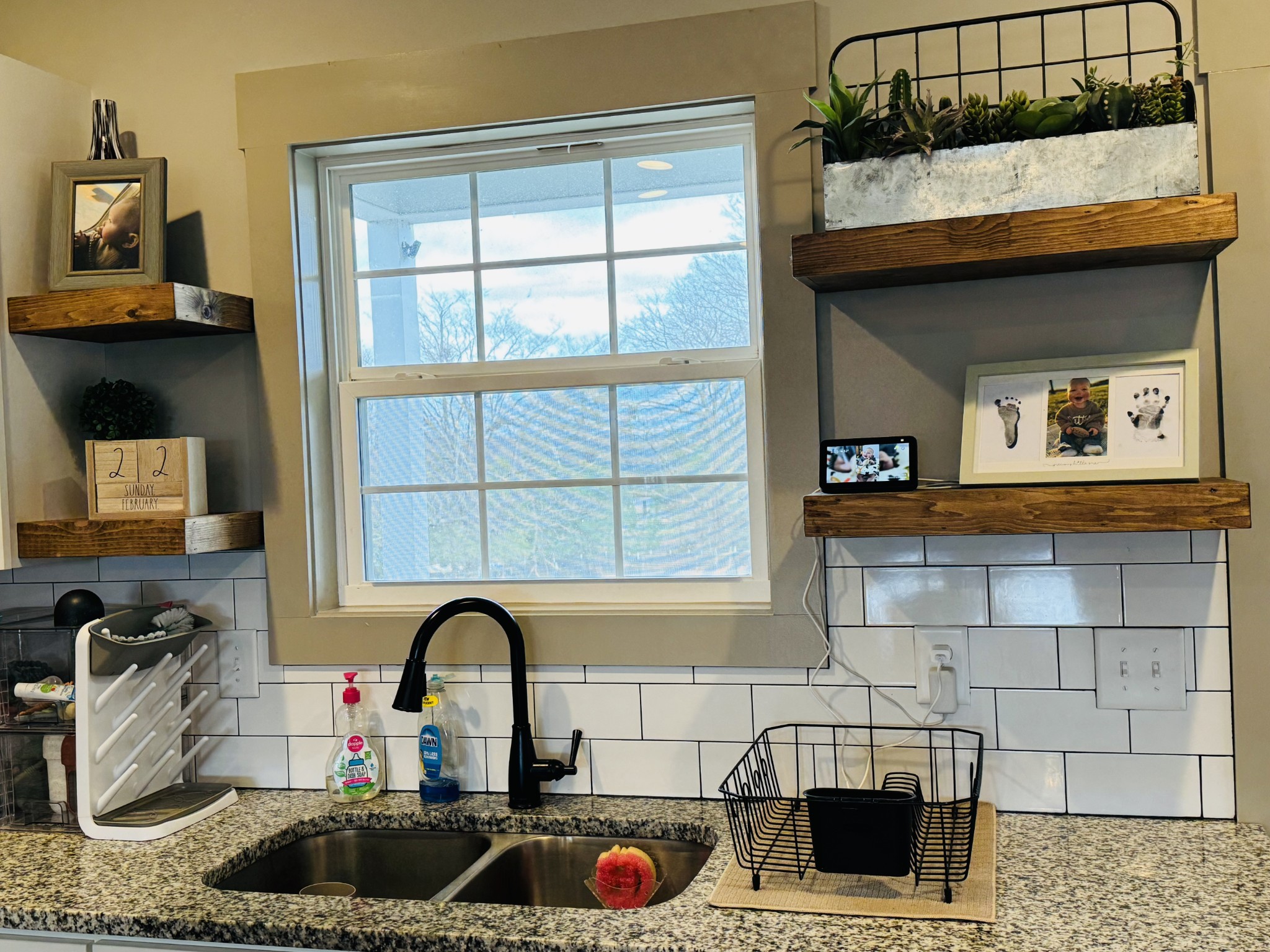 319 Lear Road Portland, TN 37148 - Photo 16 of 32 a kitchen with a sink and a stove top oven