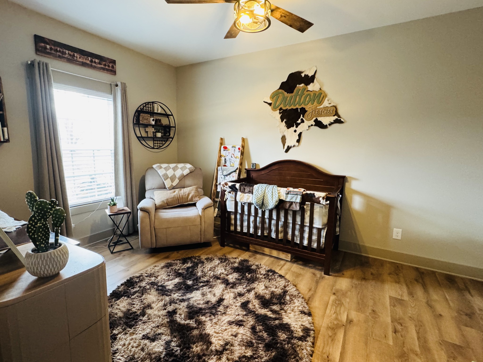 319 Lear Road Portland, TN 37148 - Photo 26 of 32 a bedroom with a bed and wooden floor