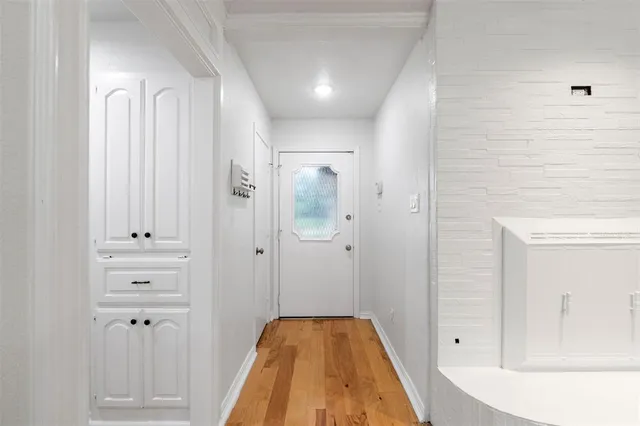 a view of a bathroom with bathtub