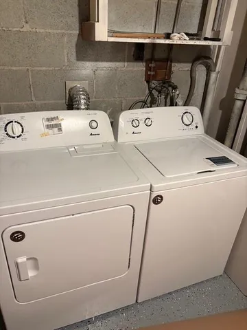 a view of backyard with outdoor seating and green space