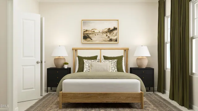 a bedroom with a bed and a painting on the wall