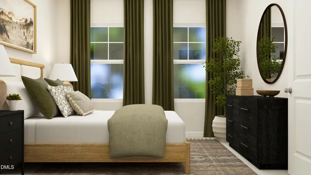 a bedroom with a bed a mirror and a window