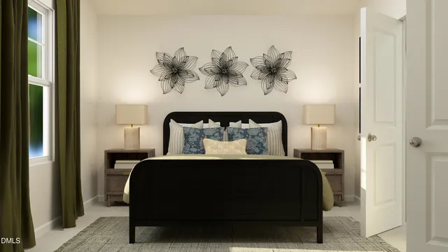 a bedroom with a bed and a painting on the wall